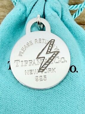 Tiffany & Co. LARGE Etched Lightening Bolt Round Tag Charm Silver